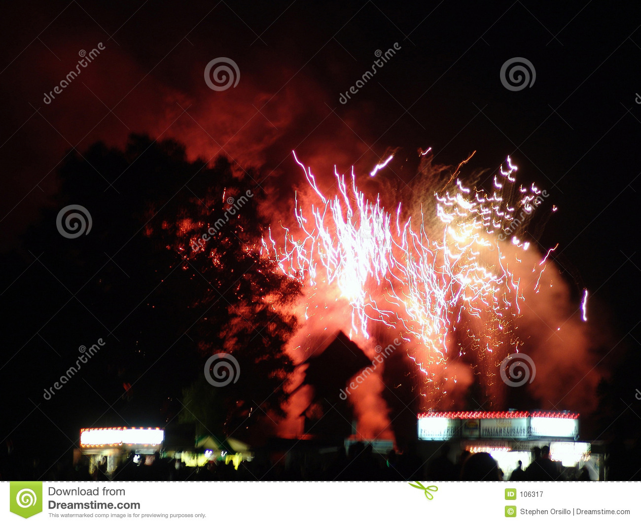 Fireworks Exploding Behind Trees Over Consession Stand Fourth Of July