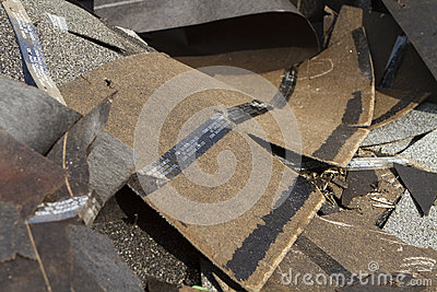 Shallow Depth Of Field Shot Of A Trash Pile Of Old Asphalt Roof