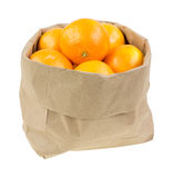 Paper Bag Filled With Small Oranges Royalty Free Stock Image