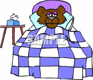 Sick Bear Laying In Bed   Royalty Free Clipart Picture