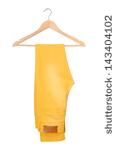 Yellow Jeans Are On Hanger    Stock Photo
