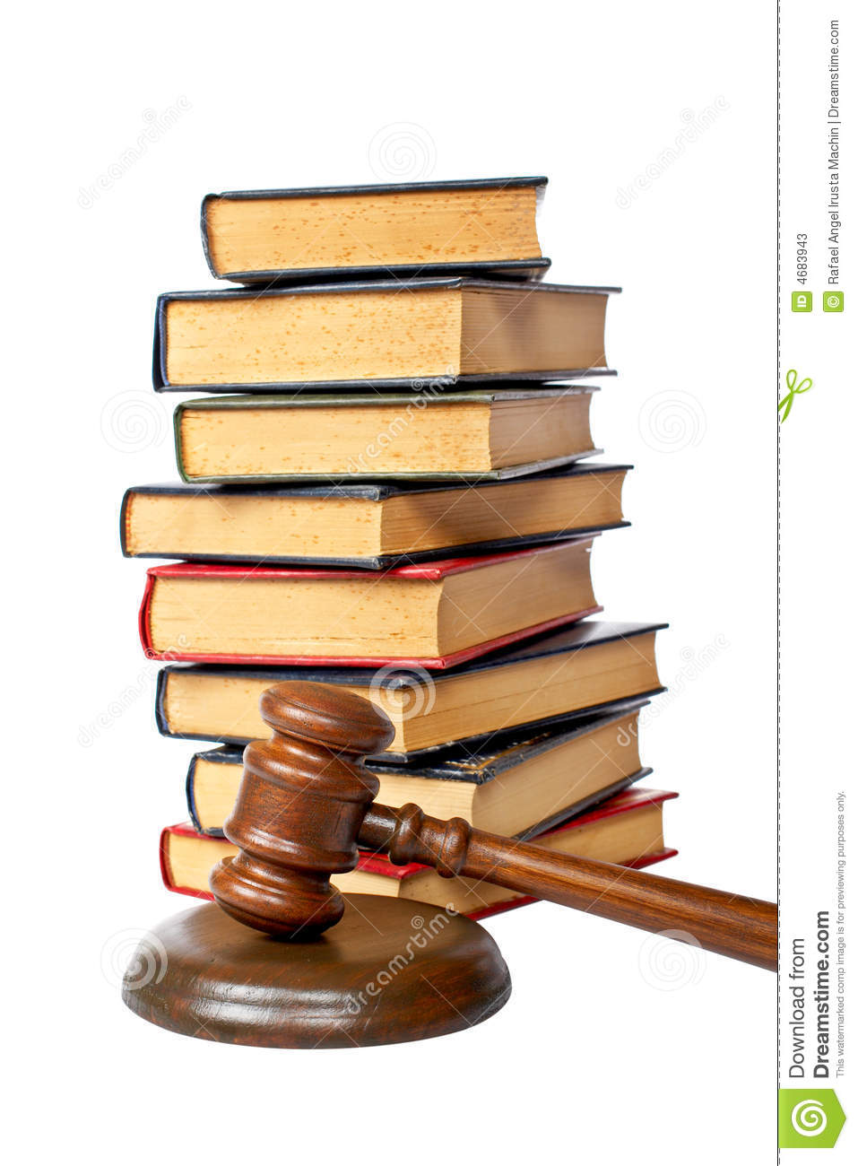 Wooden Gavel From The Court And Old Law Books Isolated On White