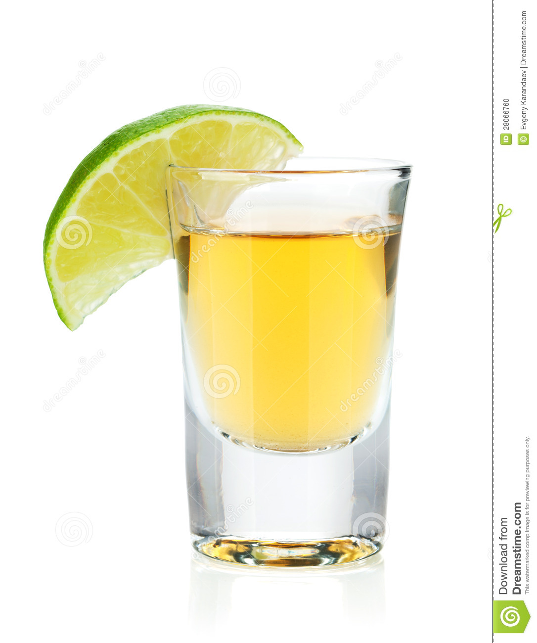 Shot Of Gold Tequila With Lime Slice  Isolated On White Background