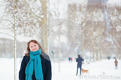     Free Stock Photography  Smiling Girl Enjoying Rare Snowy Day In Paris