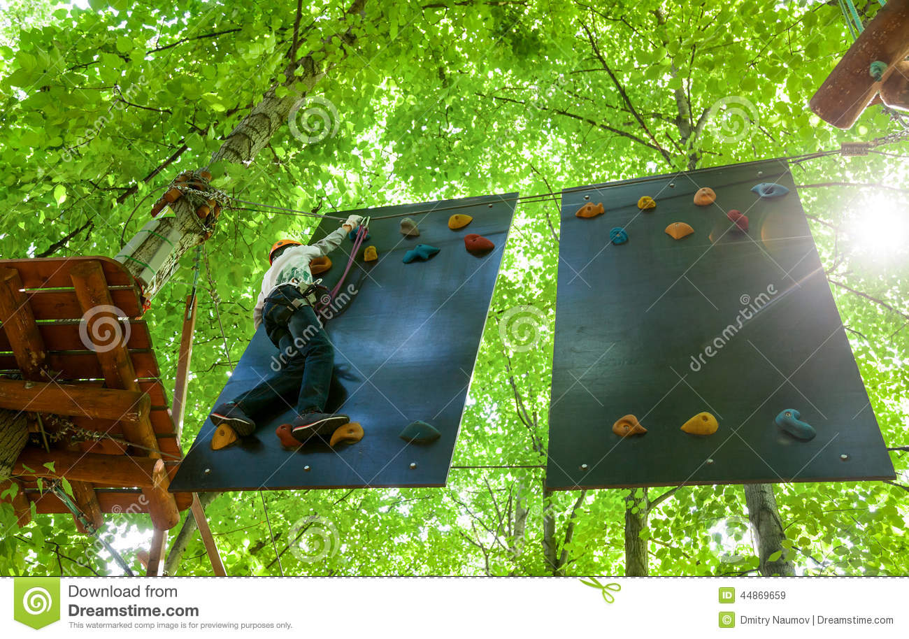 Kid In A Treetop Adventure Park Stock Photo   Image  44869659
