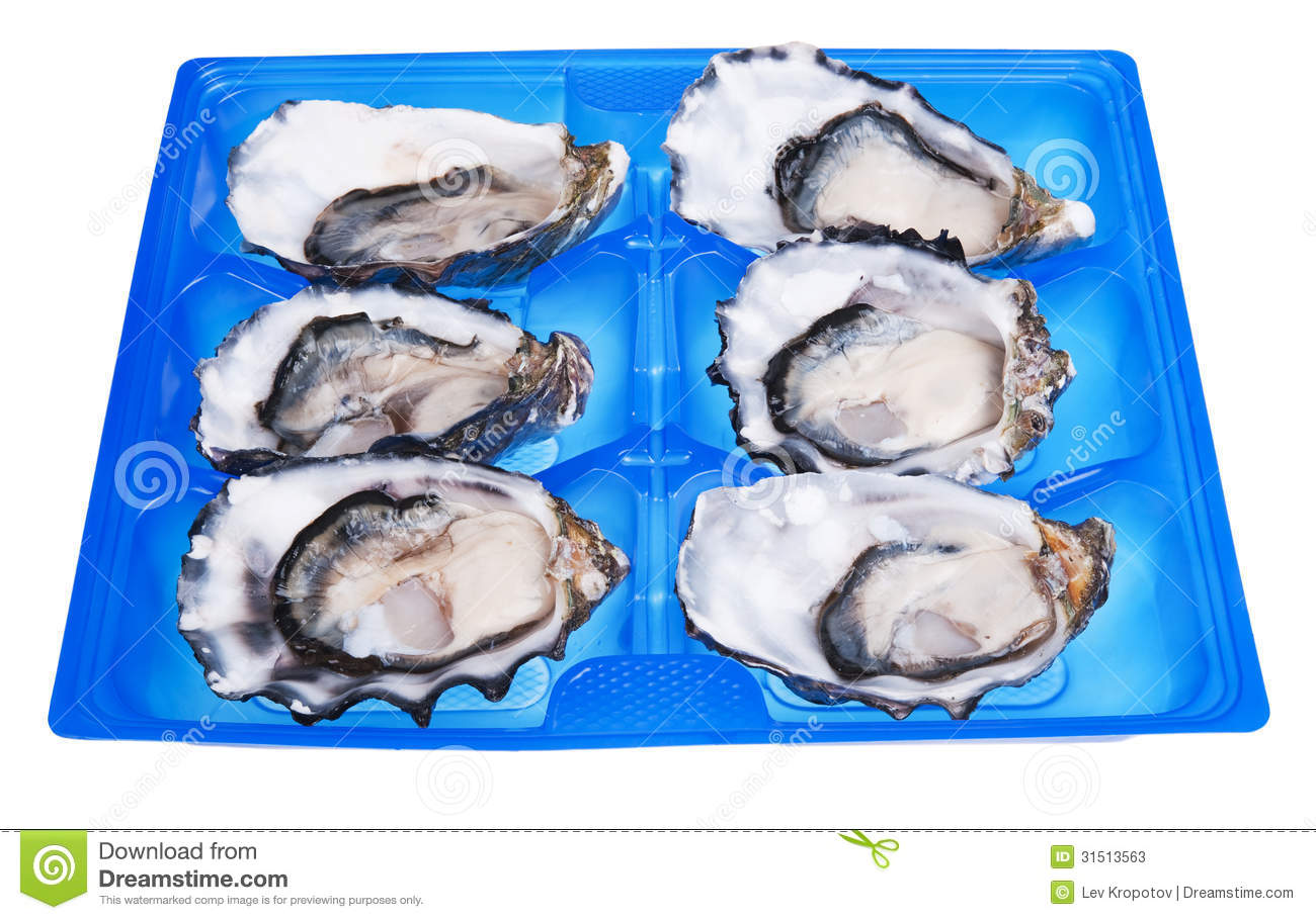 Half A Dozen Oysters In Blue Box Isolated On White Background