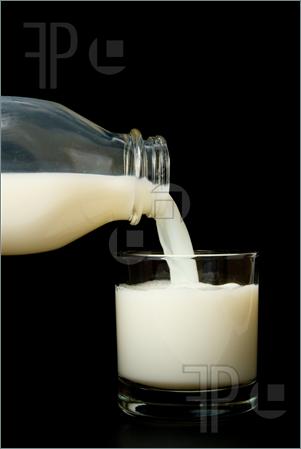 Milk Pouring Into Glass Clip Art