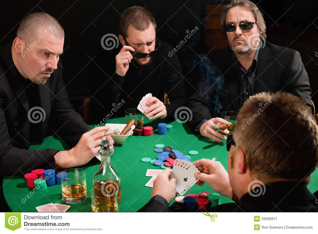 Photo Of Three Male Poker Players Staring Across In Anger At The    
