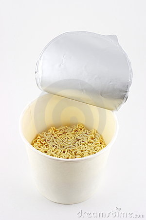 Closeup Of Instant Noodles In Cup With Lid Peeled Back Studio