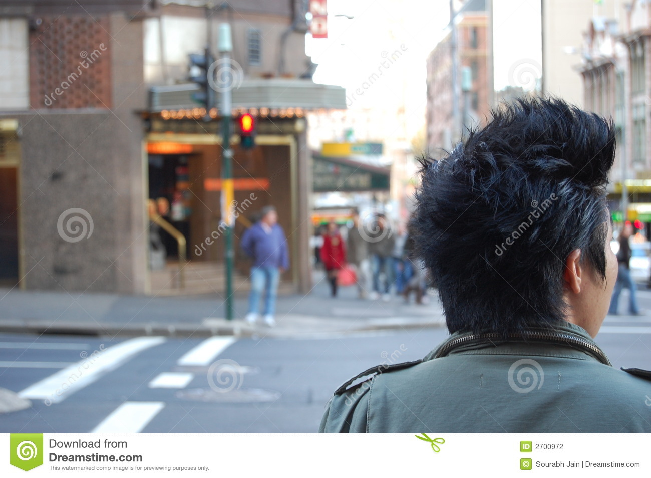 Young Person Looks Before Crossing The Street