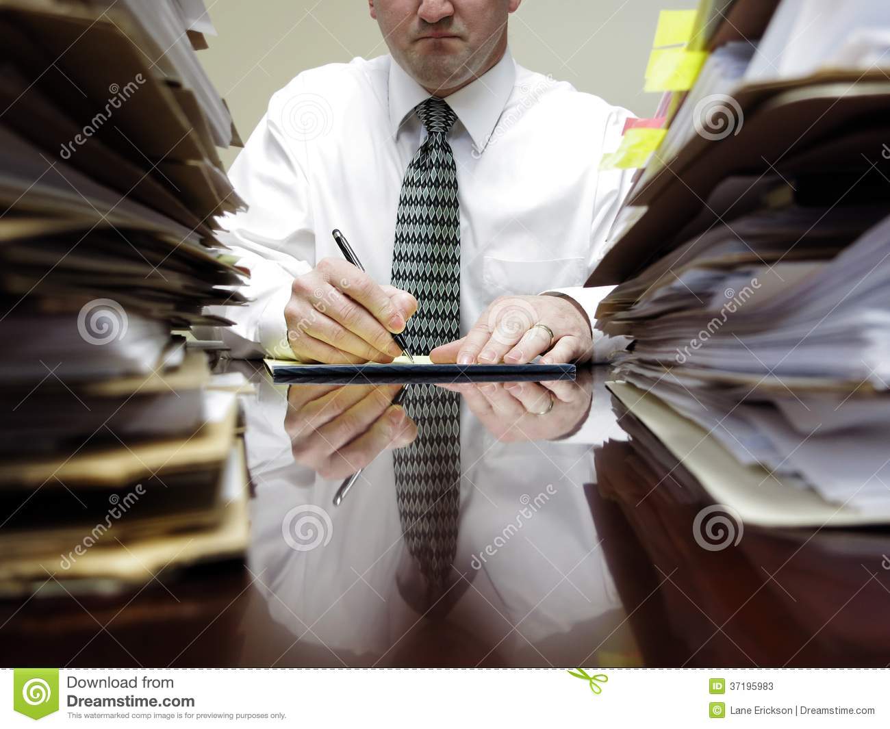 Businessman At Desk With Piles Of Files Stock Photos   Image  37195983