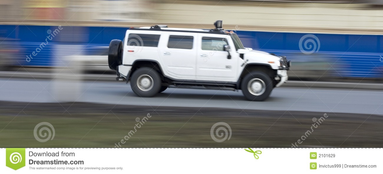 Stock Images  White Huge Hummer Suv Car Driving Fast Rushing Forward