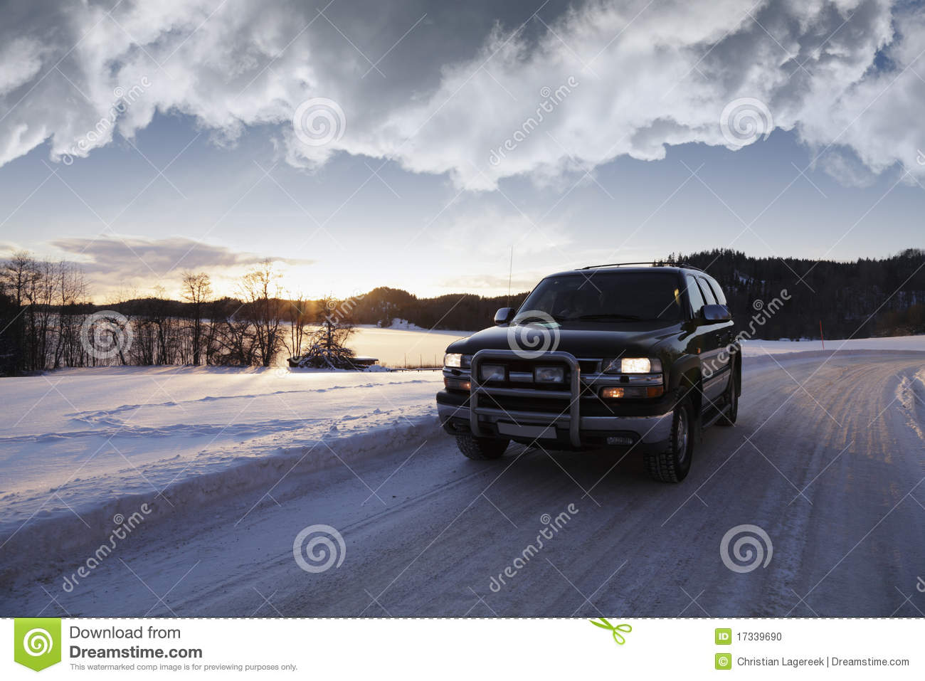 Suv Driving Through Winter Scenery Stock Photo   Image  17339690