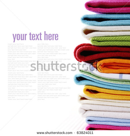Pile Of Linen Kitchen Towels On A White Background  With Sample Text