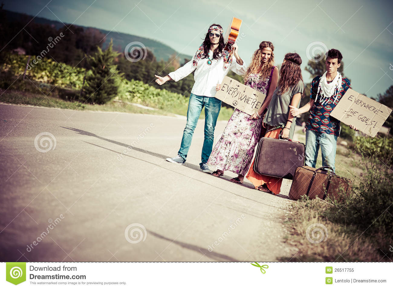 Royalty Free Stock Photo  Hippie Group Hitchhiking On A Countryside