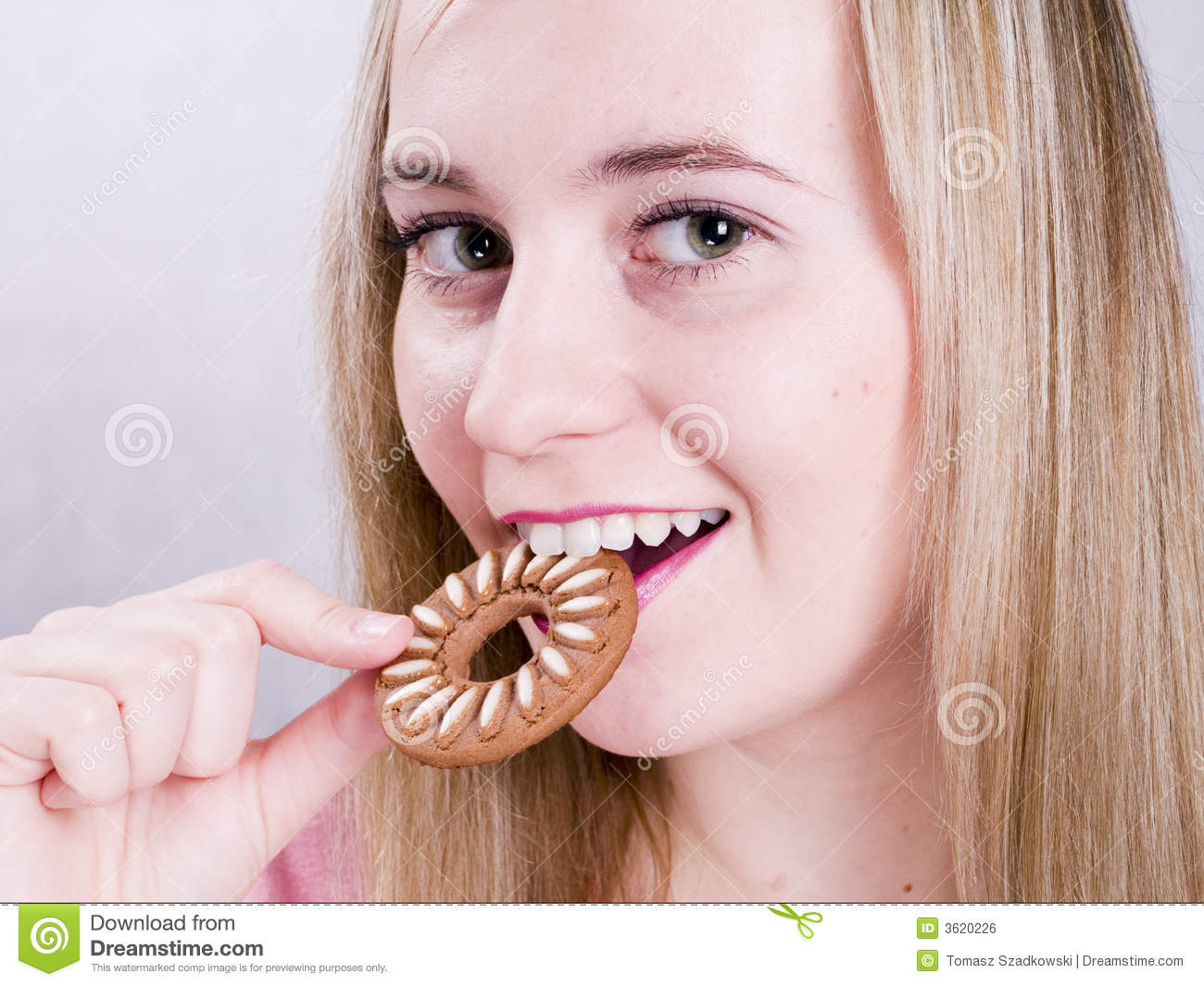 Blonde Girl Eating Cookie Royalty Free Stock Image   Image  3620226