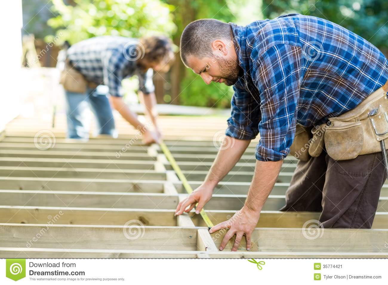 Carpenters Measuring Wood With Tape At Stock Image   Image  35774421