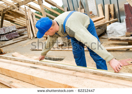 Measuring Length Of Wood Timber With Measuring Tape   Stock Photo
