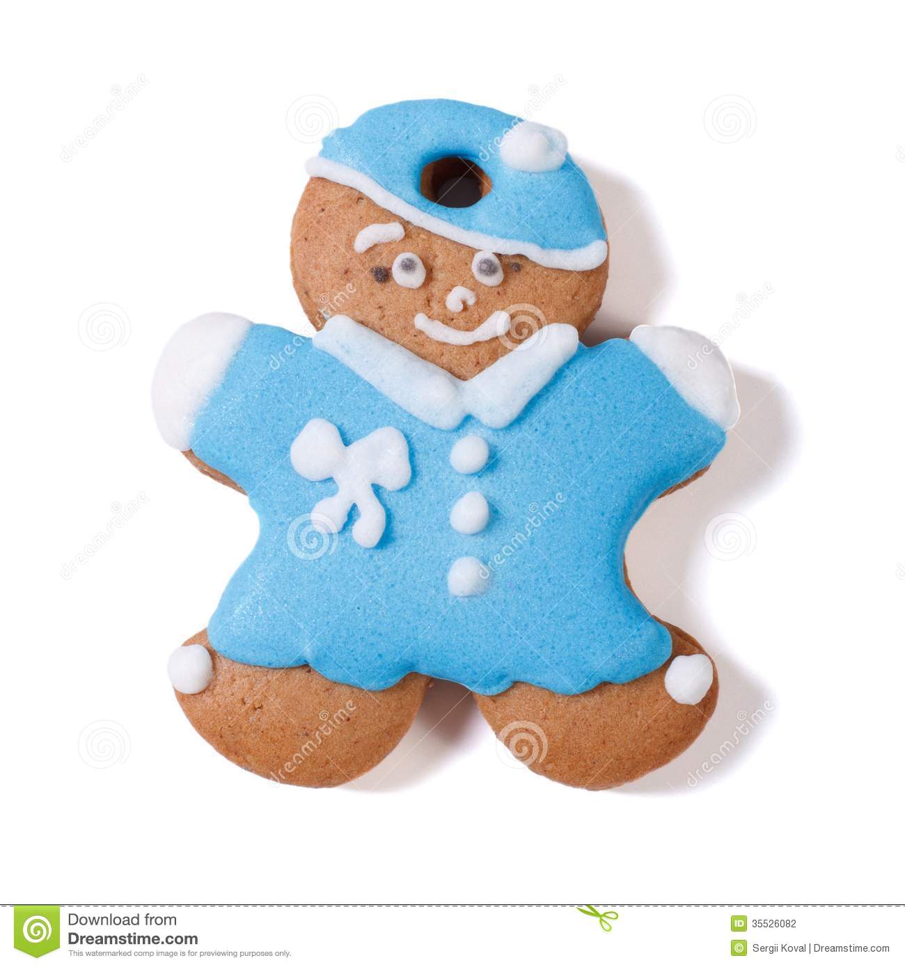 Gingerbread Man In A Blue Coat And Hat Isolated Stock Photography