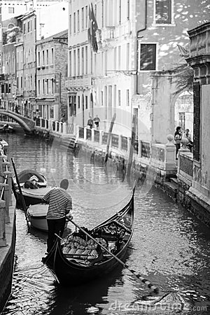 Gondolier Has Moving From The Canal To Be His Gondola In Venice