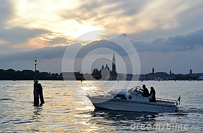 Motorboat Moving In Venice Lagoon At Sunset In Spring  Editorial Stock