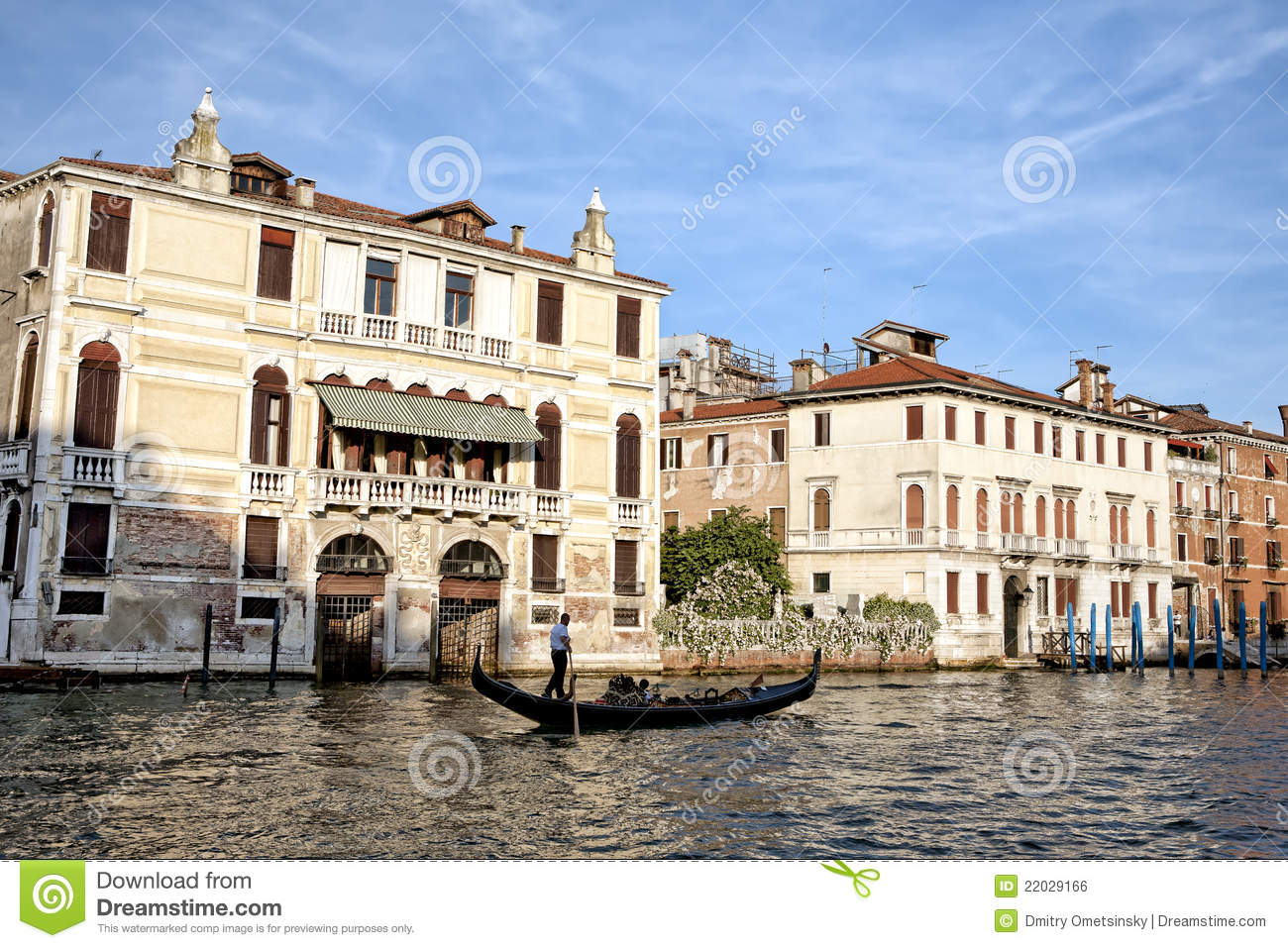 Moving Gondola On Golden Waters Of Grand Canal At Sunset In Venice