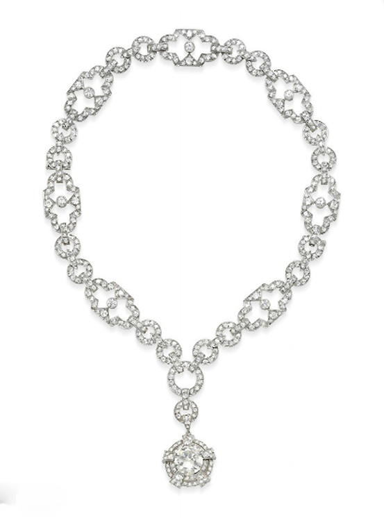 An Art Deco Diamond Pendant Necklace Suspending A Circular Cut Diamond    