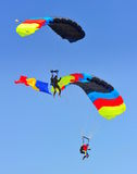 Sky Divers With Colorful Parachutes Stock Images