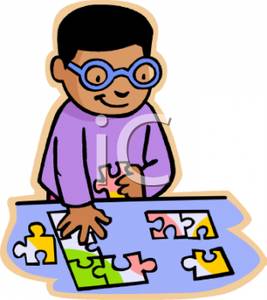 Black Boy Doing A Puzzle   Royalty Free Clipart Picture