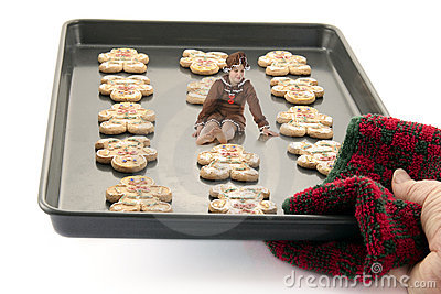     Cookiess On A Cookie Sheet Held By A Woman S Hand  Isolated On White