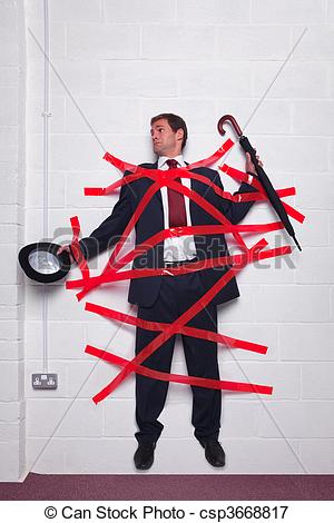 Stock Photo   Businessman Stuck To Wall With Red Tape   Stock Image