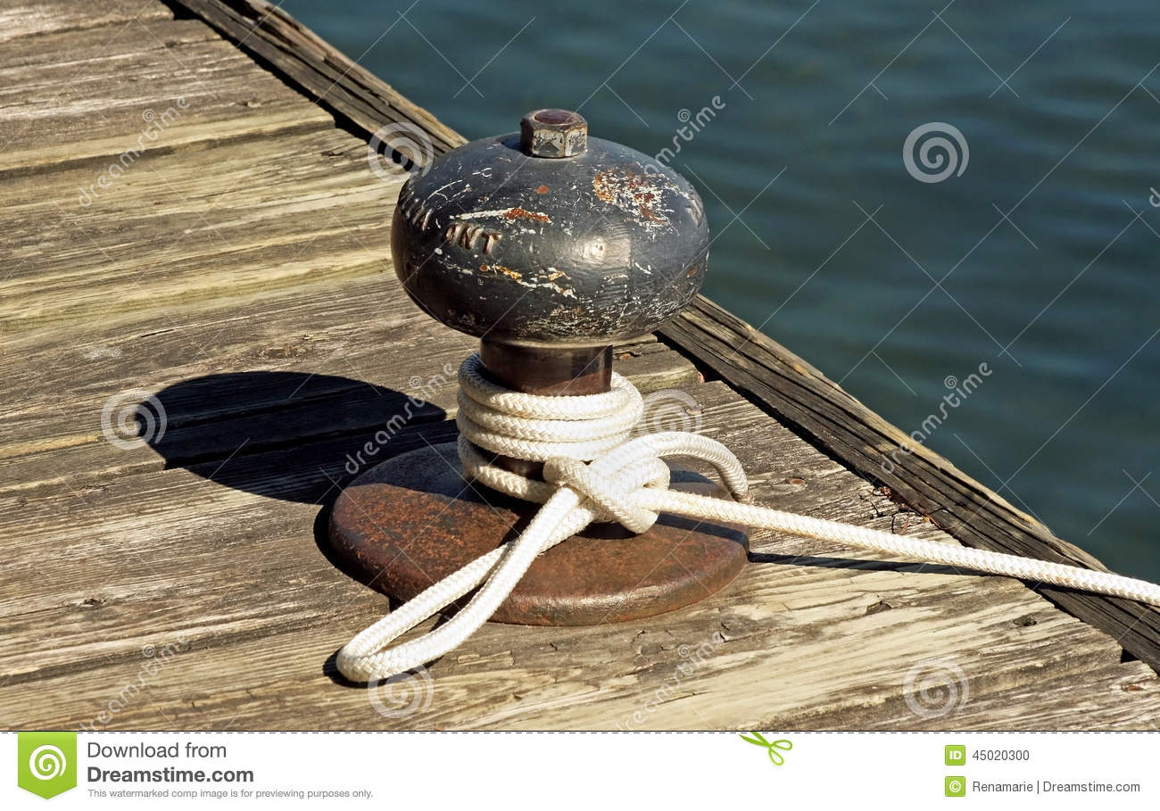 Rope Tied To A Metal Boat Slip At Dock