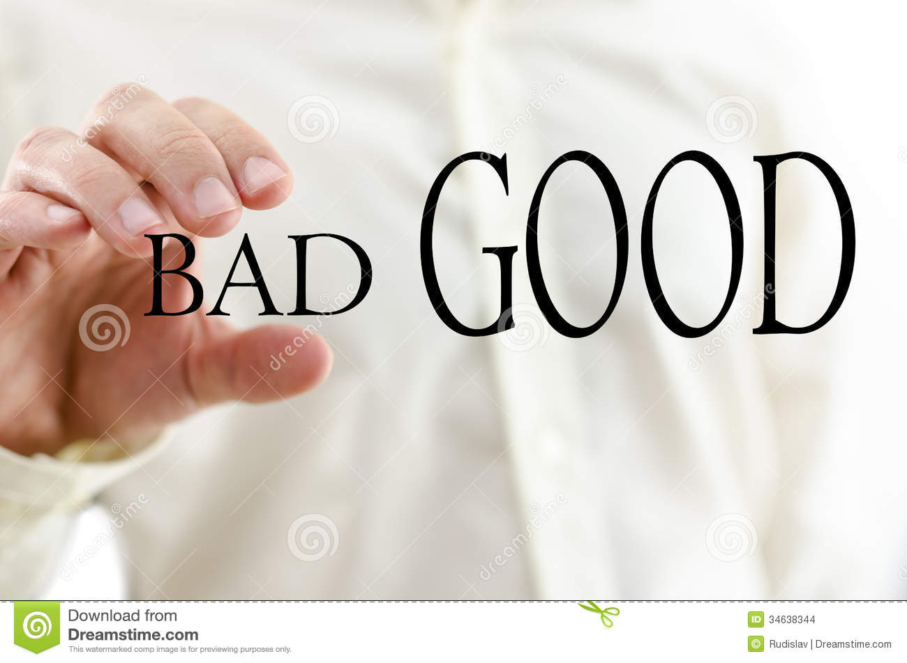 Male Hand Squeezing Word Bad And Letting Word Good Prevail 