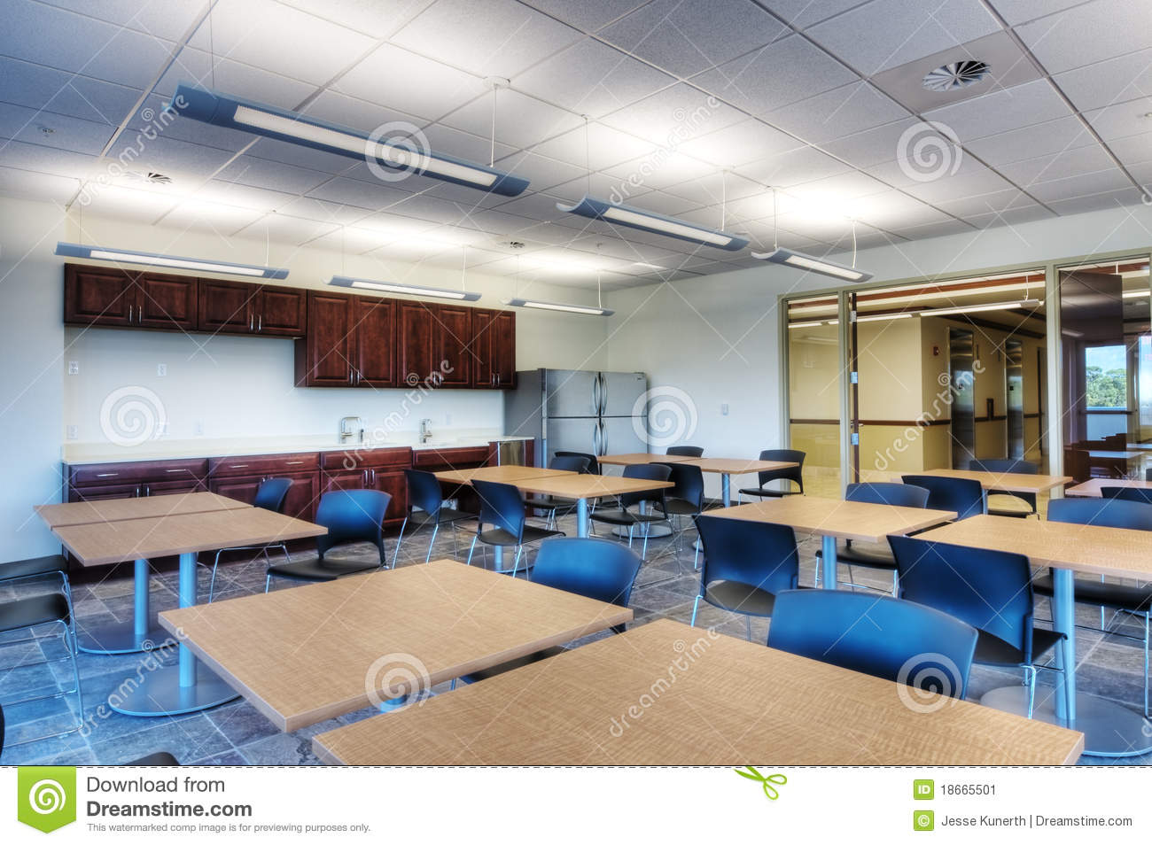 Break Room With Table And Chairs In Office Building