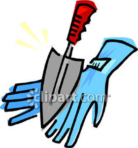 Garden Gloves And A Hand Spade   Royalty Free Clipart Picture