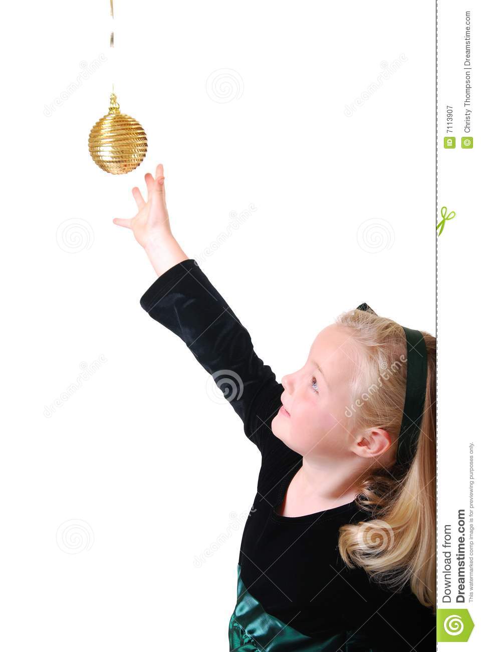 Girl Reaching For Ornament Royalty Free Stock Photography   Image