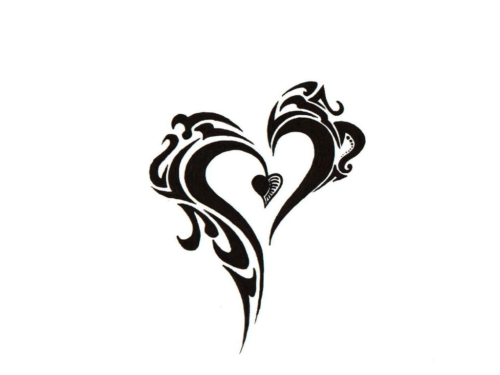 Heart Tattoo With Tribal Design   Amazing Tattoo Design