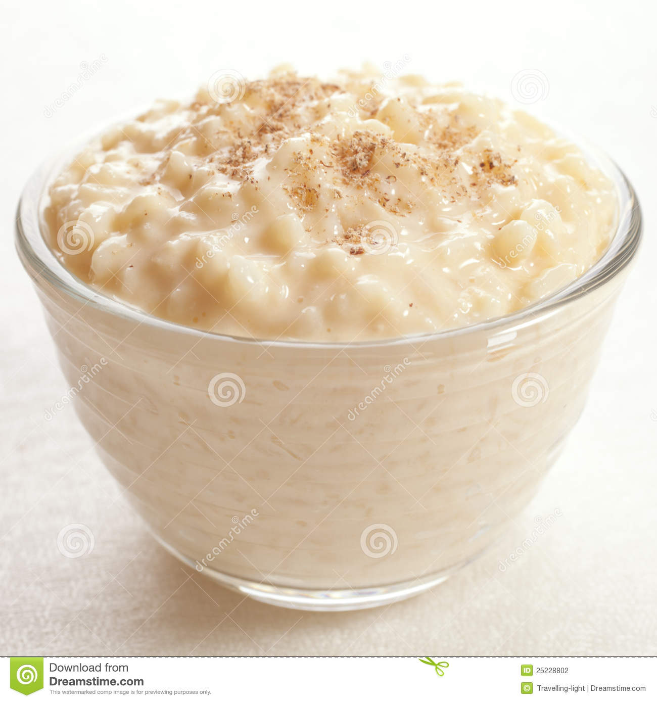 Rice Pudding Sprinkled With Nutmeg In An Individual Glass Bowl