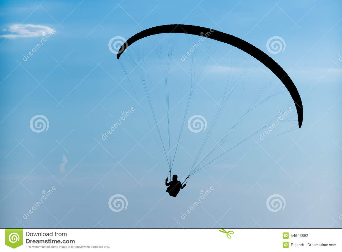 Of Man With Parachute With Dark Blue Skies In The Background