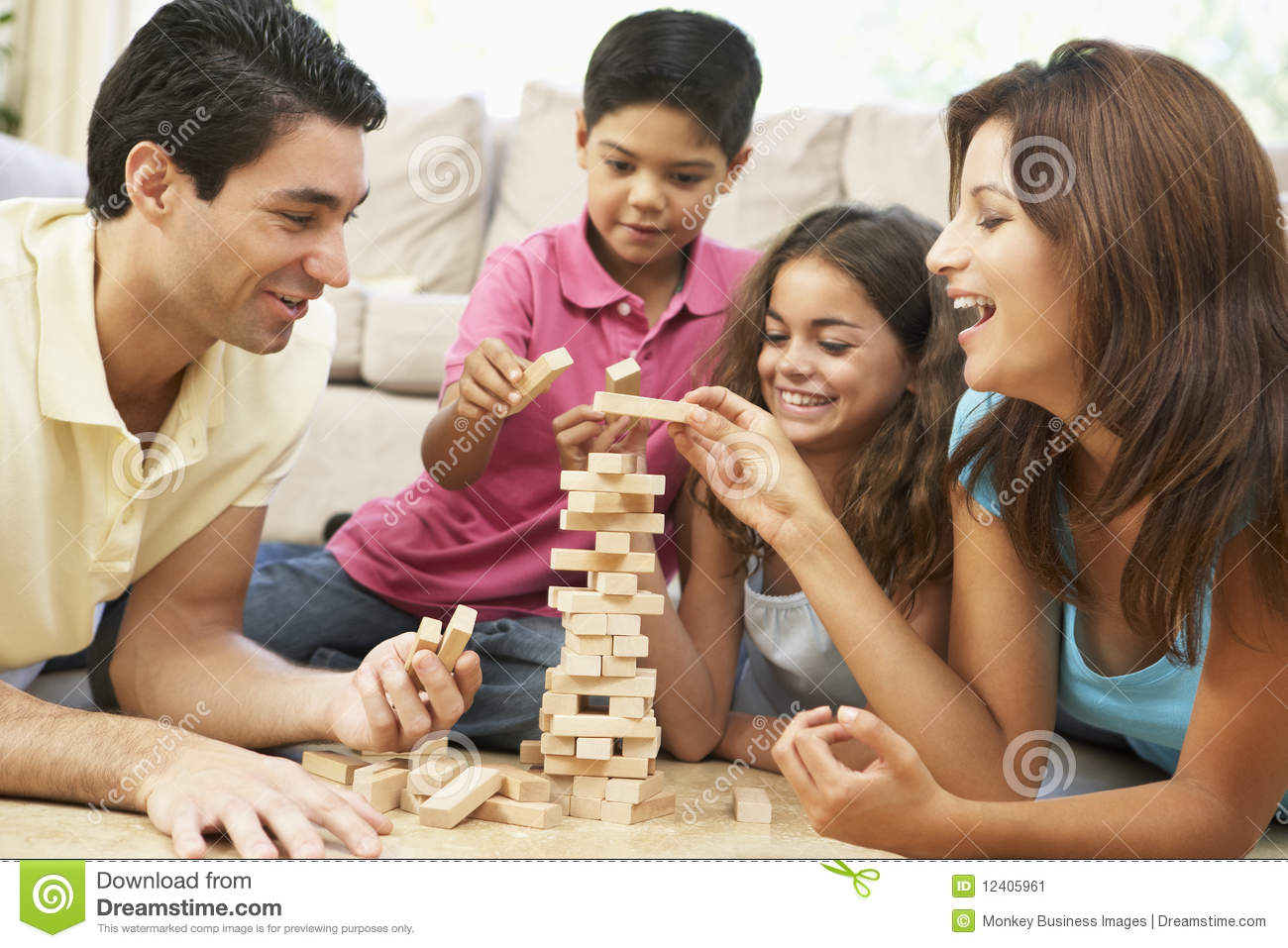 Family Playing Game Together At Home Stock Image   Image  12405961