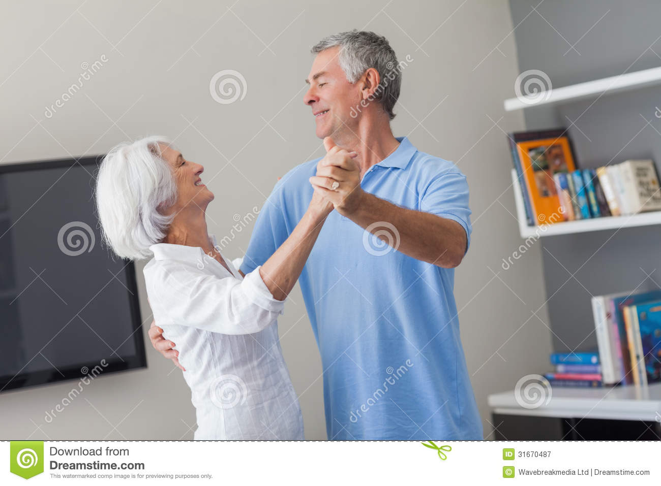 Free Stock Photography  Elderly Couple Dancing In The Living Room