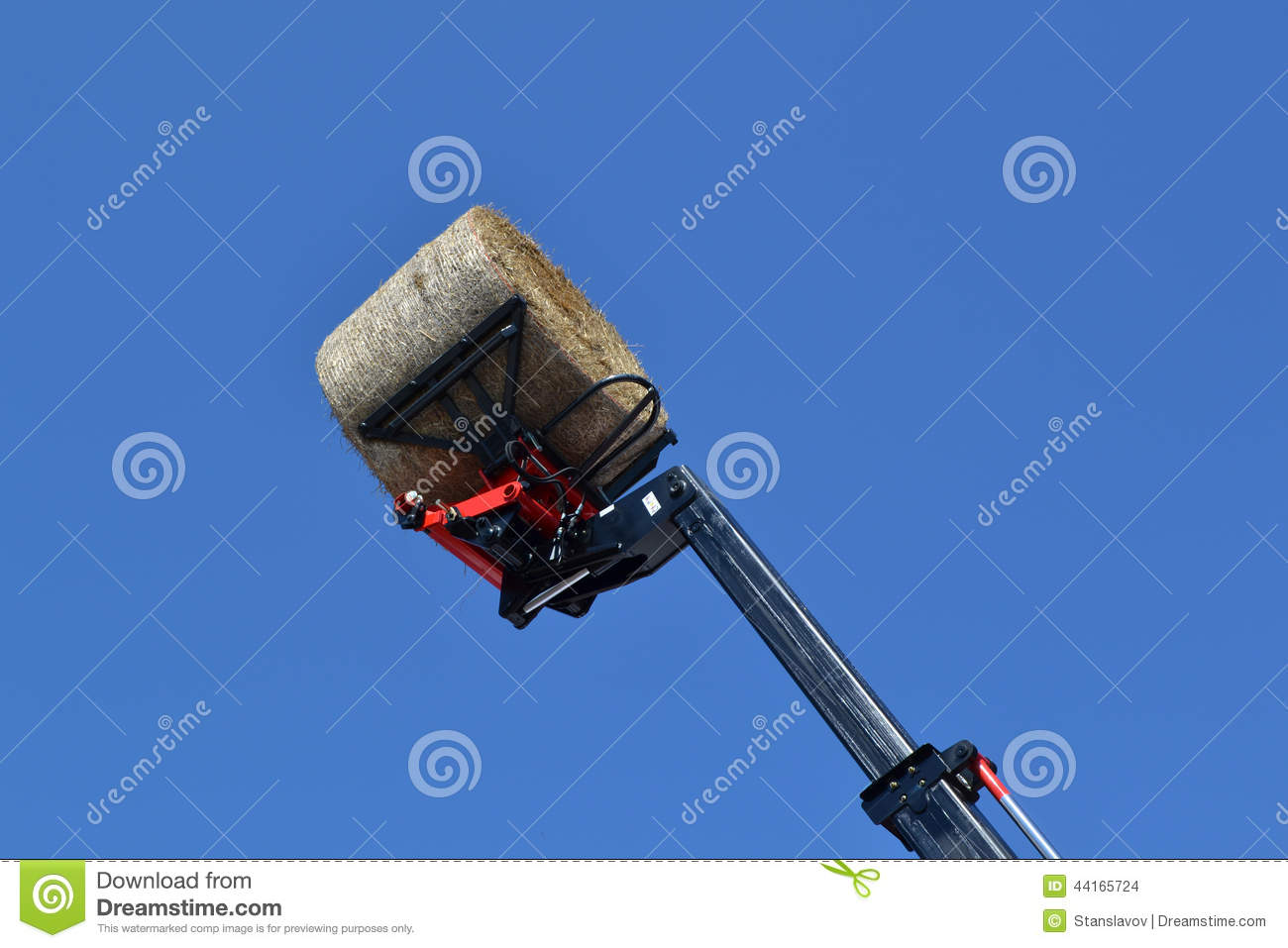 Tractor Pick Up A Round Bale Stock Photo   Image  44165724