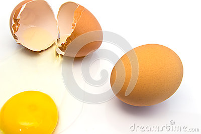 Yellow Yolk And Transparent Albumin Or Egg White Running Over A White