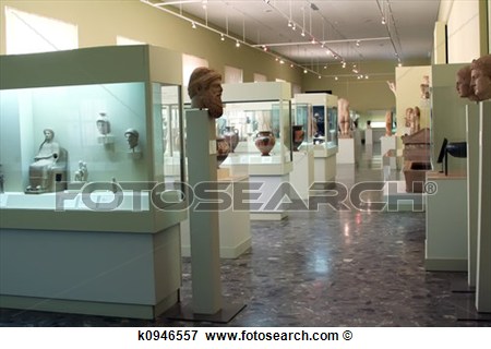 Museum Exhibits Of Ancient Relics In Glass Cases