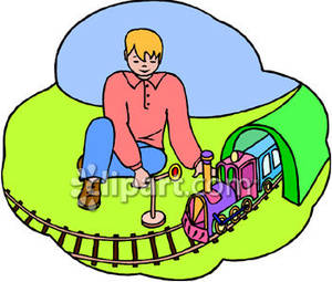 Boy Playing With A Toy Train   Royalty Free Clipart Picture