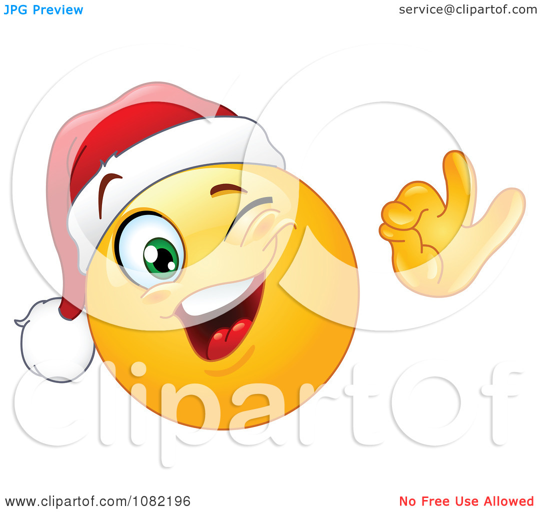 Clipart Winking Christmas Emoticon Smiley Face Wearing A Santa Hat