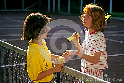 Two Girls At Summer Camp Demonstrate Good Sportsmanship After Their