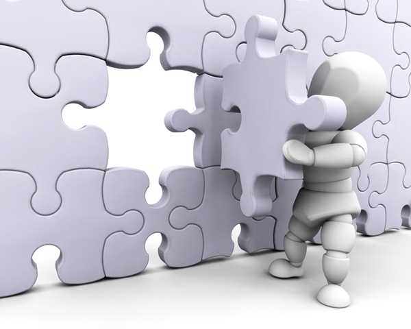 Clipart Illustration Of A White Character Inserting The Final Jigsaw
