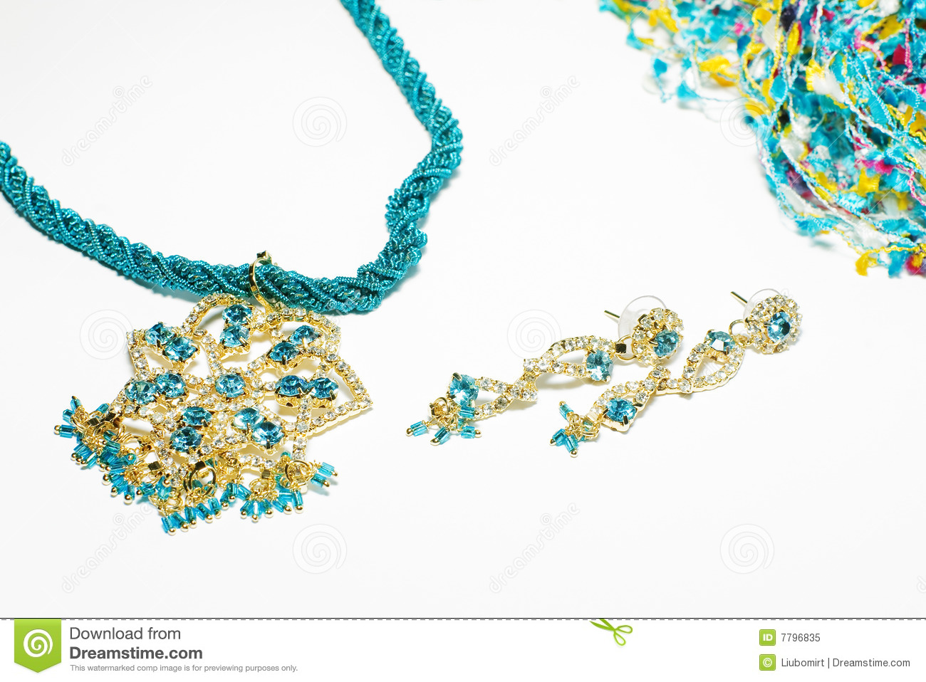 Golden Blue Costume Jewelry Earrings And Necklace Isolated On White