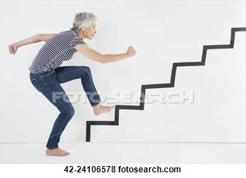 Picture   Determined Woman Climbing Stairs  Fotosearch   Search Stock    